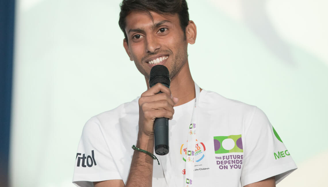 A sports spokesperson addressing an audience