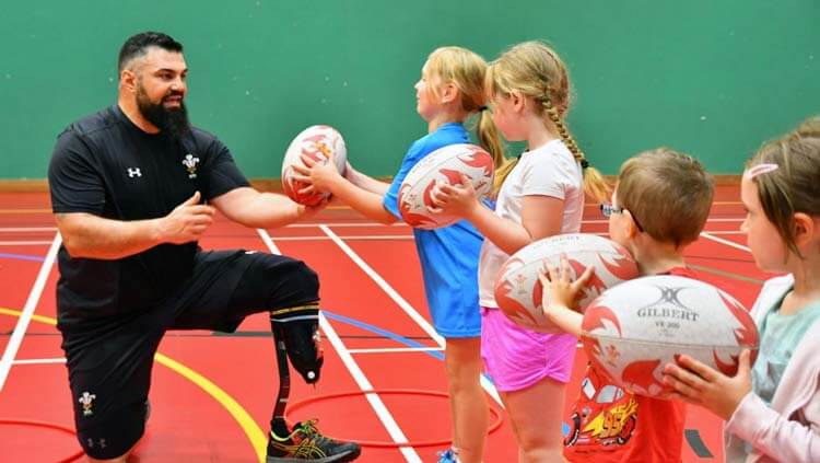 Disabled rugby played teaching children sport